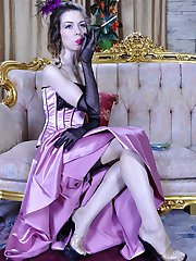 Glam babe in a fancy evening gown completed with black gloves and stockings