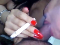 indonesian babe giving bj whilst smokin'