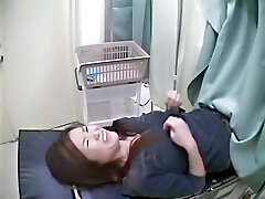 A fresh girl is examined on the gynecological table in this hot medical voyeur flick