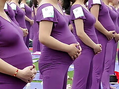 Pregnant Asian dolls doing yoga (non porn)