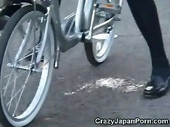 College Girl Sprays on a Bike in Public! 