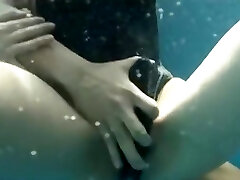 Navy bikini underwater play