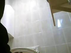 Asiatic women spied in public wc peeing