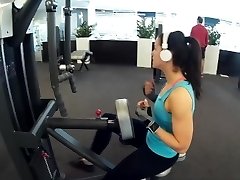 Fitness girl training biceps triceps