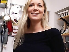 Outstanding German MILF with ample boobs dildoing her shaved vulva in the kitchen