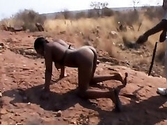 African babe gets caned in the middle of nowhere