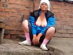 Russian granny demonstrates her tits off
