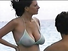 hot big tit mother at the beach