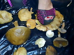 Lady L punch  mushrooms with extreme gaga high heels.