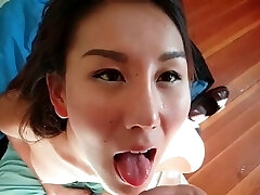 Asian gal deepthroat and a facial