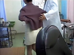 Kinky doc fake penis penetrates Asian in the medical office