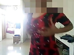 Indian college Girl milks in the kitchen.