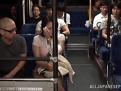 Two Guys Screwing a Busty Chinese Girl's Big Boobs in the Public Bus