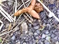 My spy camera captured an Asian honey urinating outdoors