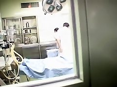 Chinese medic and his nurse fuck in the medical department