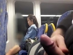 Asian chick looking at my cock at the bus