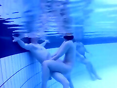 Nudists in the pool get filmed underwater