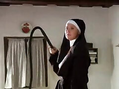 Marionette girl is tied up and whipped by a fantastic nun