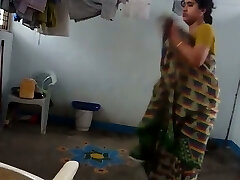 Indian amateur housewife was caught on hidden cam while undressing