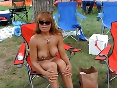 Pierced mature nudists flash everything off at the resort