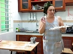 Ravioli Time! Naked Cooking. Regina Noir, a naturist cook at nudist hotel resort. Nude maid. Bare hou