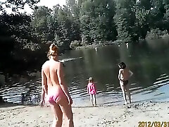 Sunny day at the naturist camp by the river