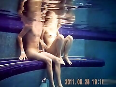 Naughty nudists enjoy banging stiff underwater in the pool