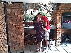 Spycam: CC TV self catering accomodation couple plumbing on front porch of nature reserve 