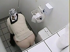 Granny got her ass on wc voyeur video while pissing