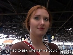 Redhead amateur with gigantic tits flashes her boobs and spills in a public place