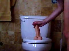 Soccer Mom with big tits ride a Dildo on Restroom