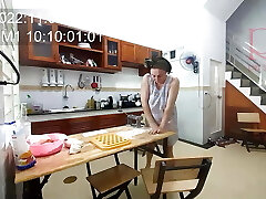 Ravioli Time! A naked housekeeper works in the hotel kitchen. Depraved housekeeper works in the kitchen without undies.