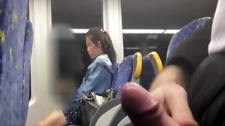 Asian nymph looking at my cock at the bus