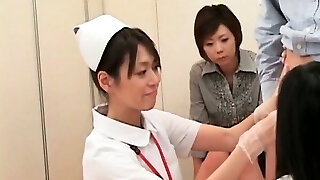 Hot asian nurses rubbing shaft for nut-juice sample