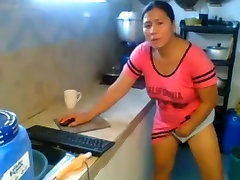 Mature pinay plays with her pussy thru her panties. Nice boobs.
