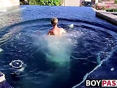 Blonde asian and block cock Tyler Thayer jerking his cock near the pool