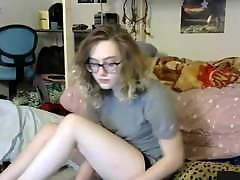 Cute T-girl with glasses masturbating on cam