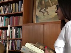 Slut in glasses gets fucked in library