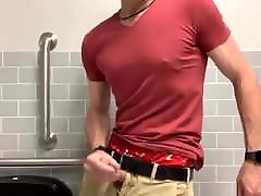 Masturbating in a public bathroom and cumming