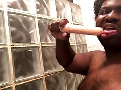 Dick sucking a transgender sex toy in the shower
