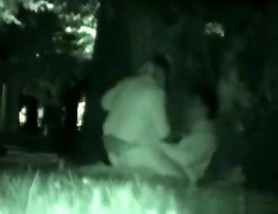 Voyeur tapes a partygirl riding a guy in the park